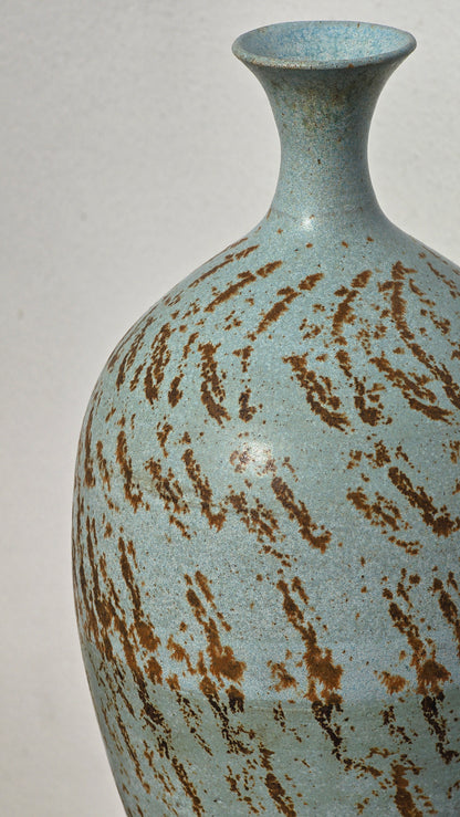 Green Bottle with Red Iron Oxide Decoration